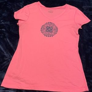 Pink short sleeve shirt.